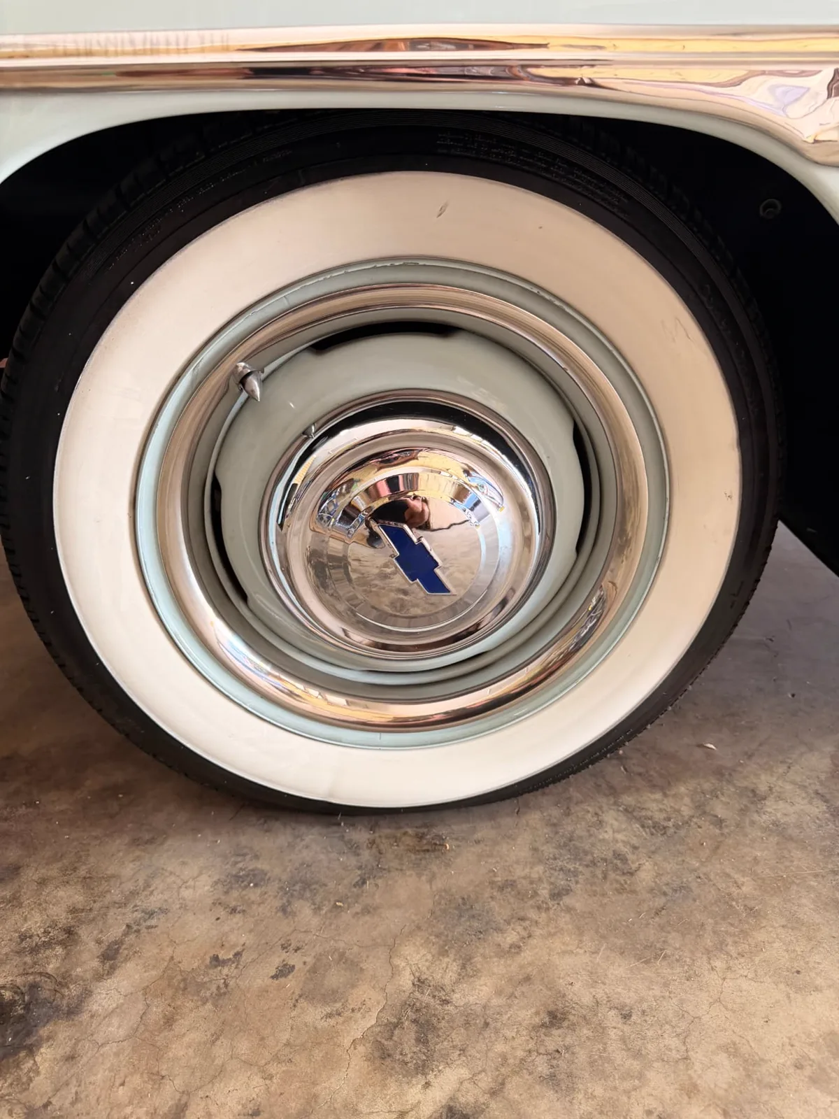 Whitewall tire and chrome Chevrolet hubcap on the detailed 1951 Chevy Fleetline